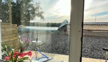 г. Омск,  ул. Иртышская Набережная, 12